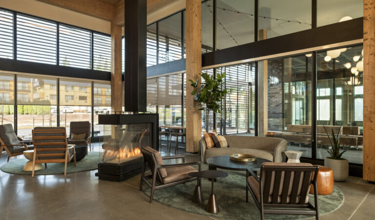 Lobby and coworking featuring mass timber at Kerf Apartments in Bellingham, WA